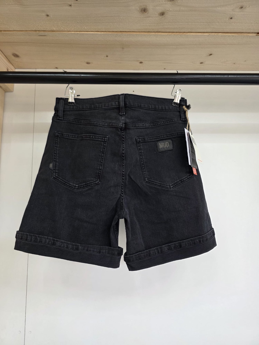 MUD Jeans black denim shorts — back view