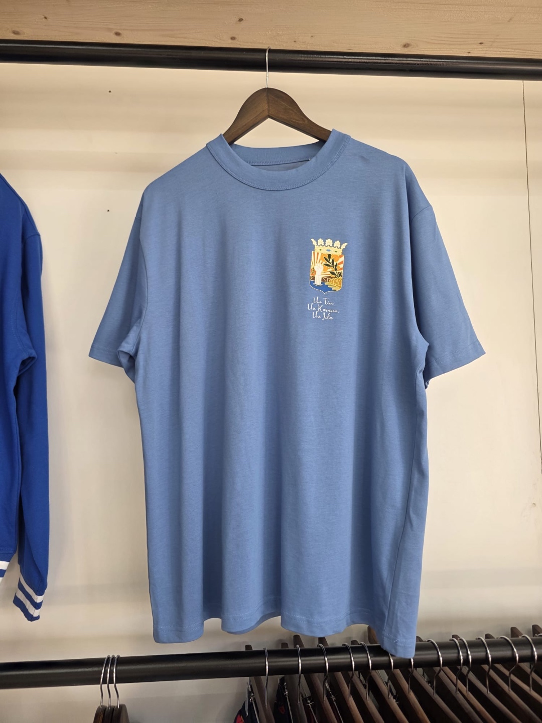 ReNova Curaçao Crest T-Shirt in sky blue with small crest on chest
