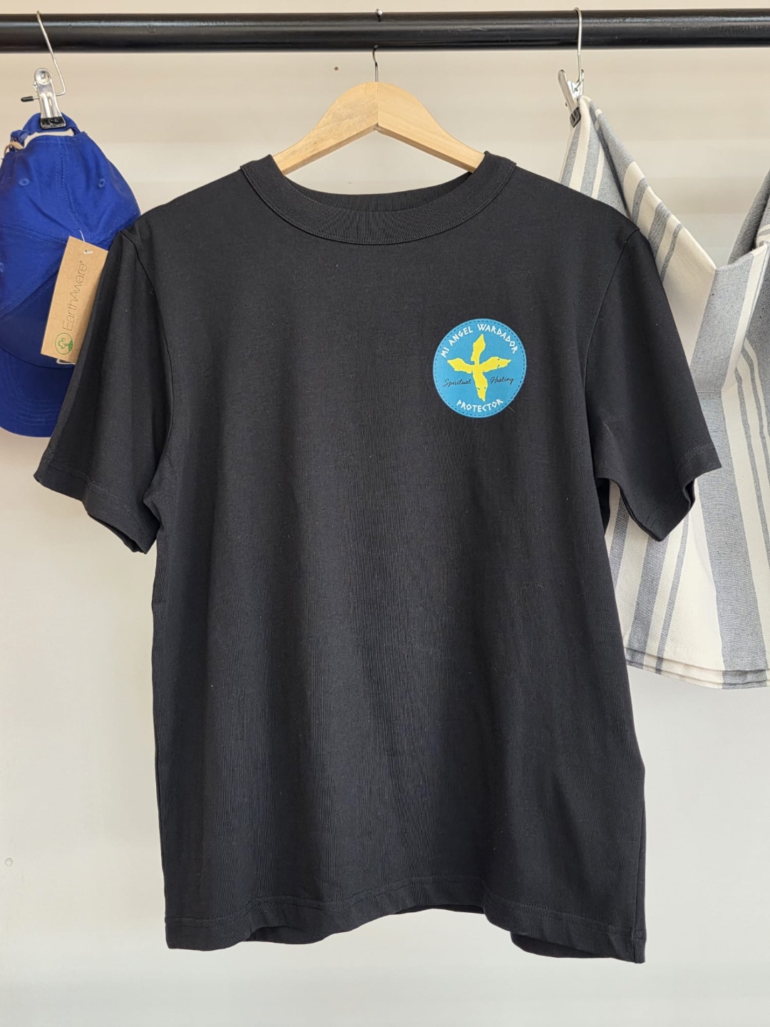 Tuushirt Mi Angel Wardador black tee — teal cross patch on chest, Spiritual Healing Protector