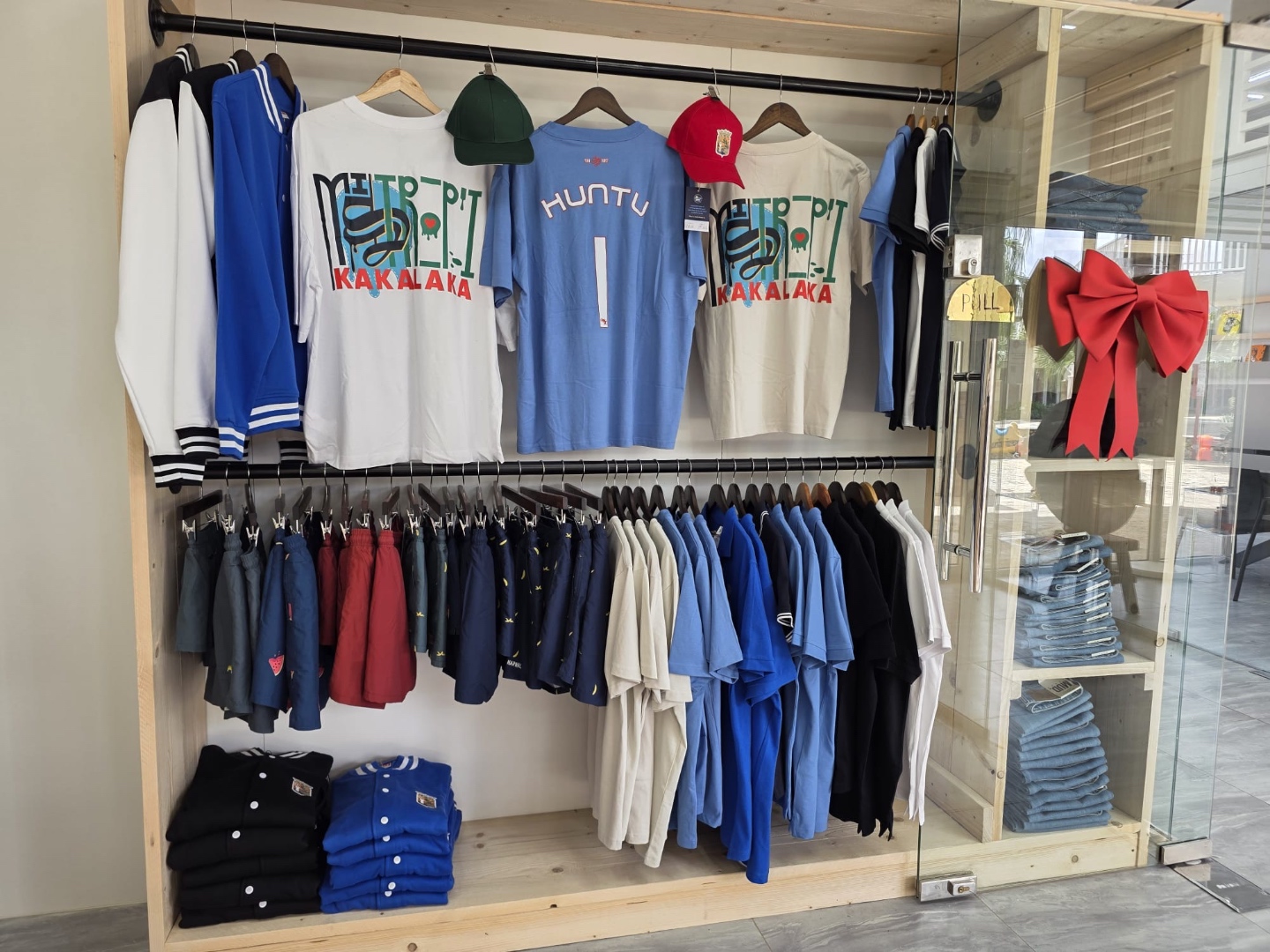 ReNova store rack with t-shirts and jackets